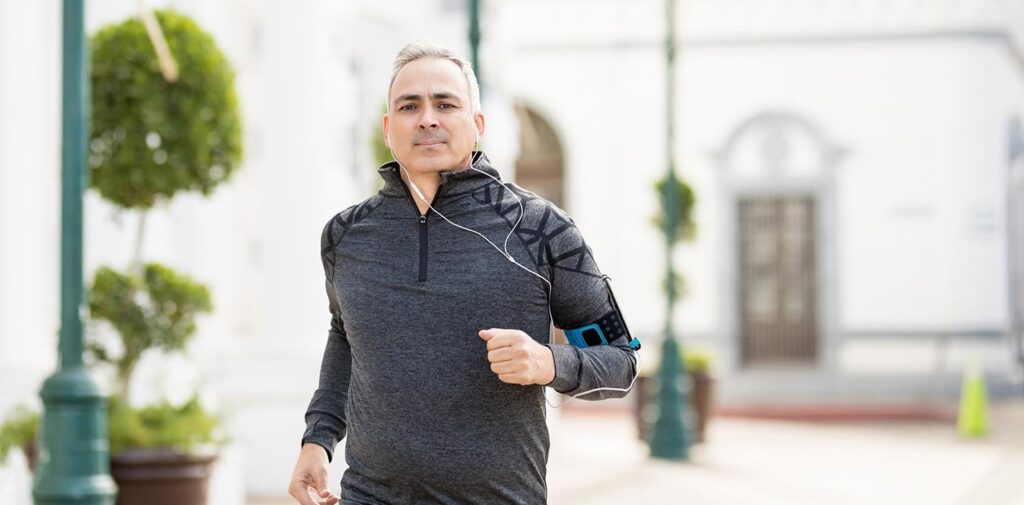 man jogging after pain treatment