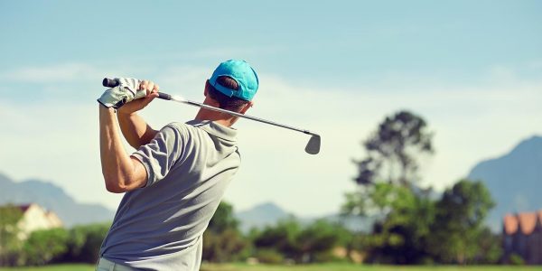1878950 man playing golf pain free