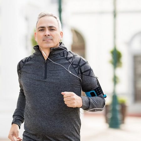 man jogging after pain treatment